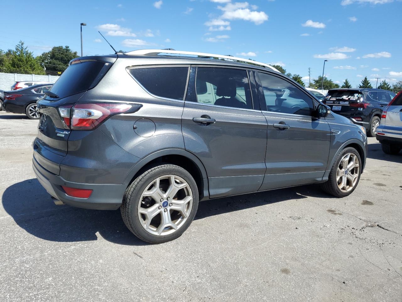 2017 Ford Escape VIN 1FMCU0JD5HUB12862 Copart auction photo, water/flood damage thumbnail 3