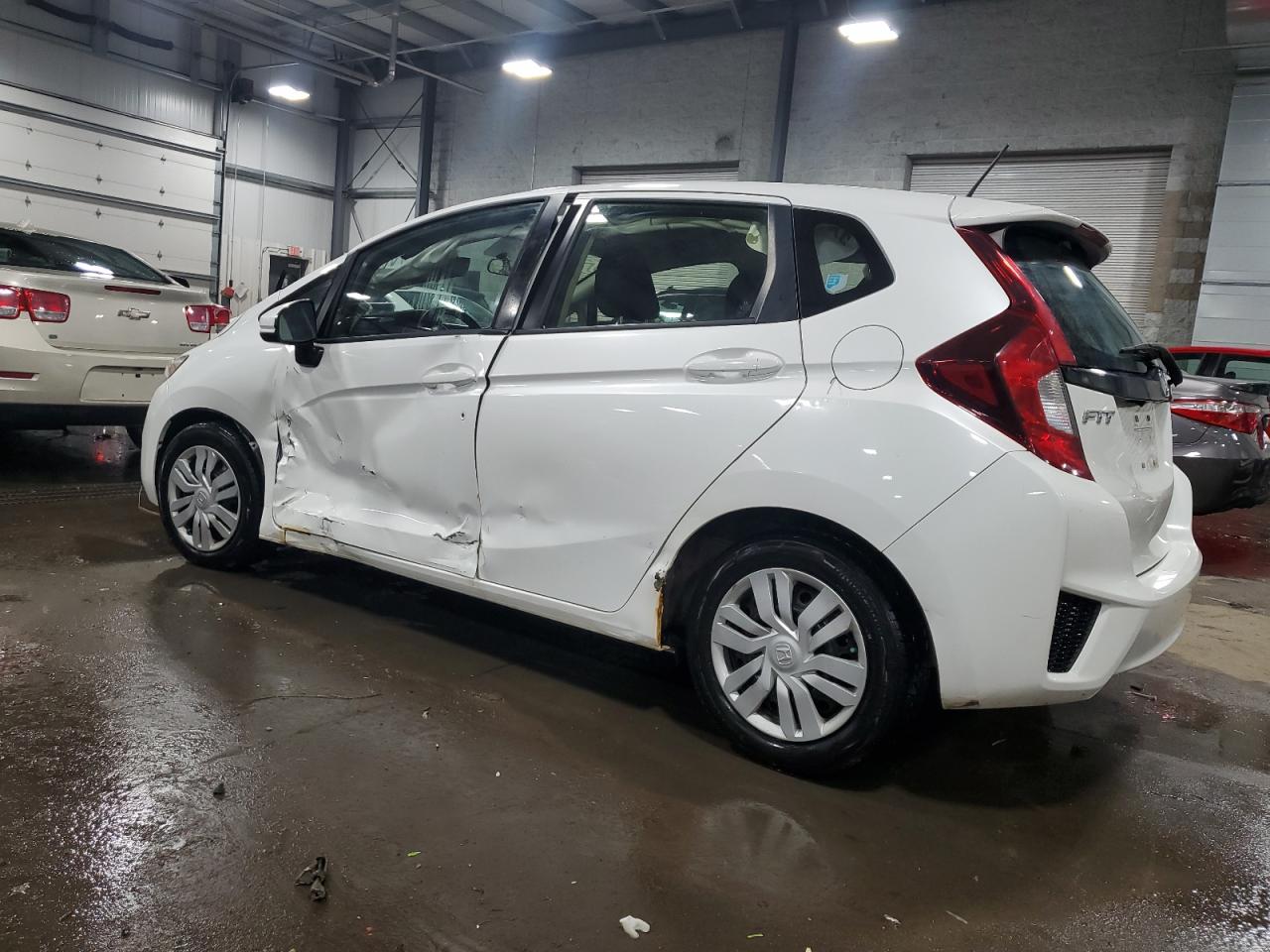 2016 Honda Fit VIN JHMGK5H56GX015222 Copart auction photo, side / front end damage thumbnail 2