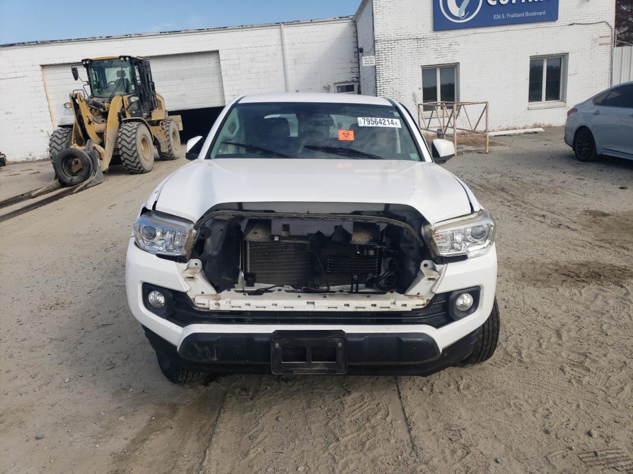 2019 Toyota Tacoma VIN 5TFAZ5CN6KX072989 Copart auction photo, front end / all over damage thumbnail 5