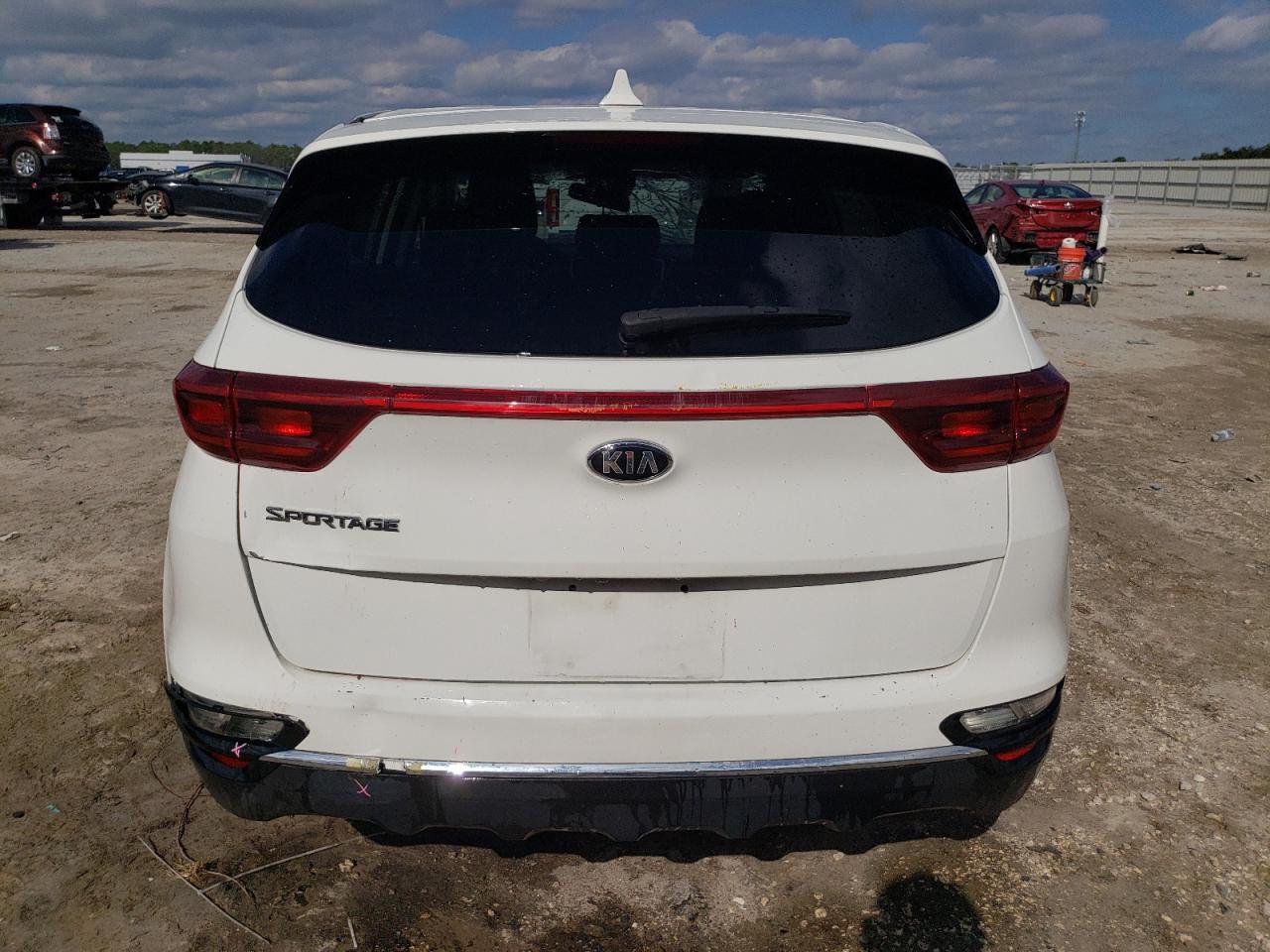 2021 KIA Sportage VIN KNDPMCAC9M7910983 Copart auction photo, top/roof / minor dent/scratches damage thumbnail 6