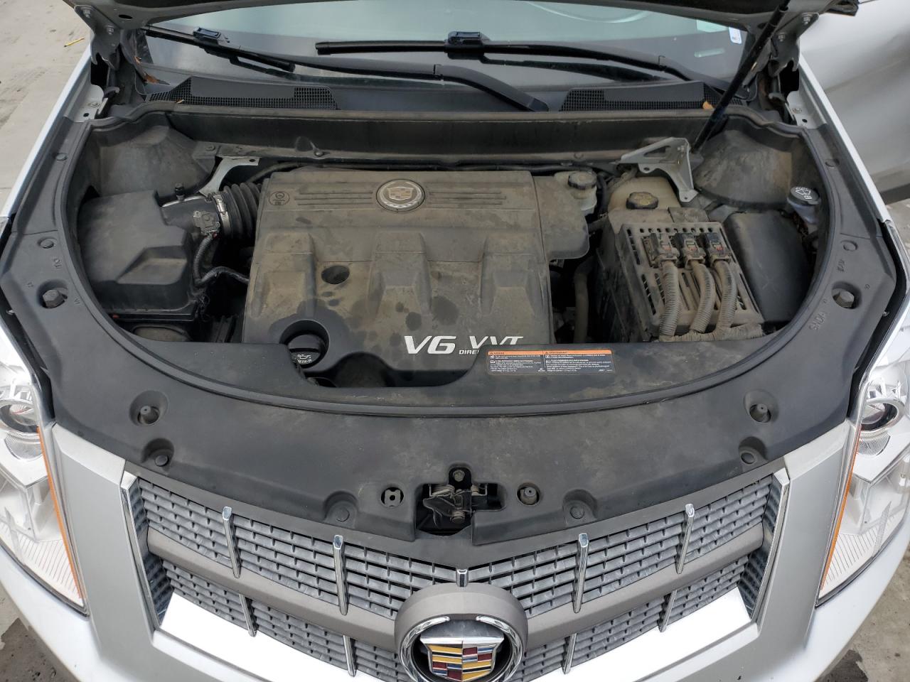 2012 Cadillac SRX VIN 3GYFNAE3XCS531024 Copart auction photo, side / minor dent/scratches damage thumbnail 12