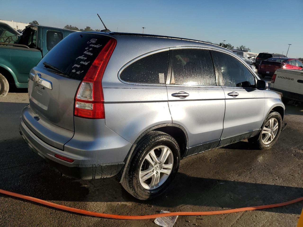 2010 Honda CR-V VIN JHLRE3H7XAC005611 Copart auction photo, front end / side damage thumbnail 3
