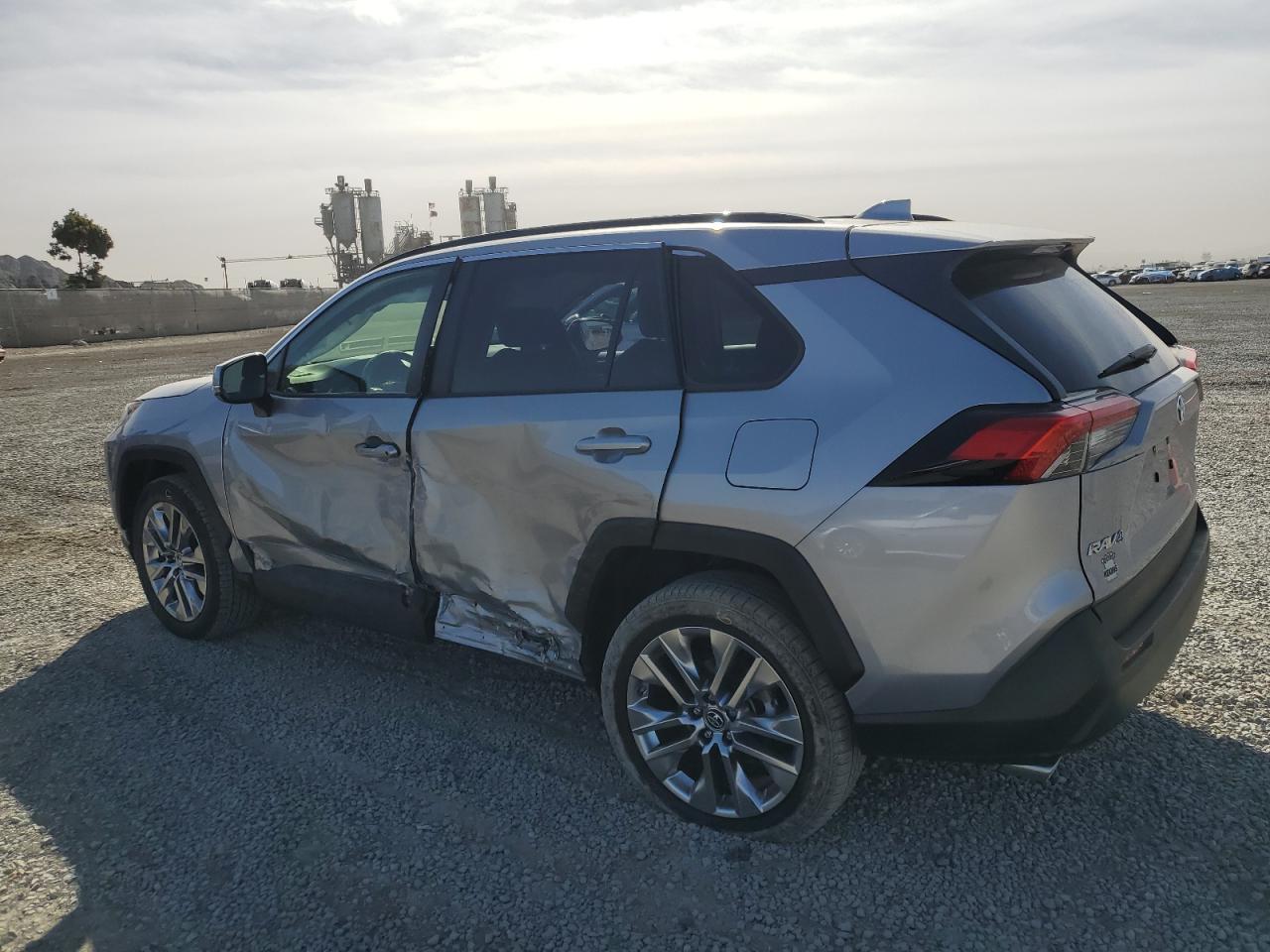 2019 Toyota RAV 4 VIN JTMA1RFV2KD514100 Copart auction photo, side / minor dent/scratches damage thumbnail 2