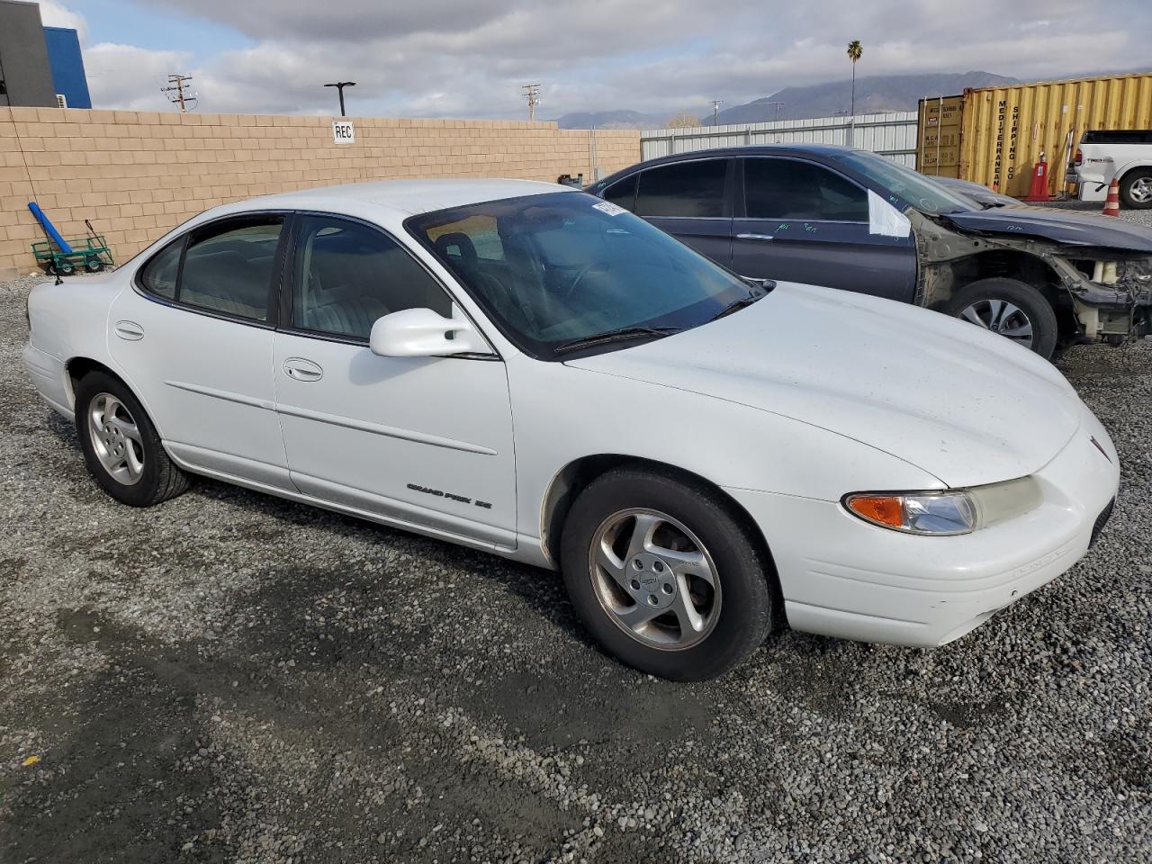 1999 Pontiac Grand Prix VIN 1G2WJ52MXXF213490 Copart auction photo, side damage thumbnail 4
