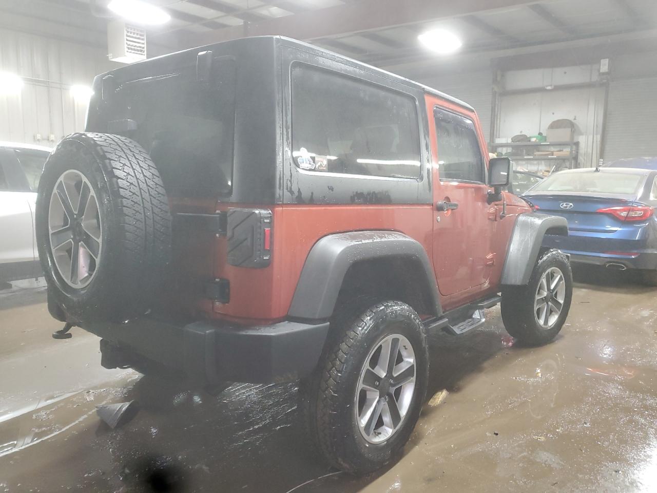 2009 Jeep Wrangler VIN 1J4GA64179L733136 Copart auction photo, front end damage thumbnail 3