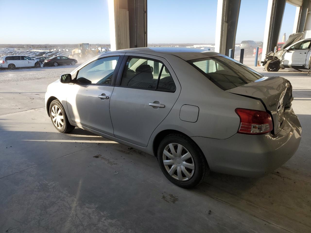 2010 Toyota Yaris VIN JTDBT4K32A1365810 Copart auction photo, rear end damage thumbnail 2