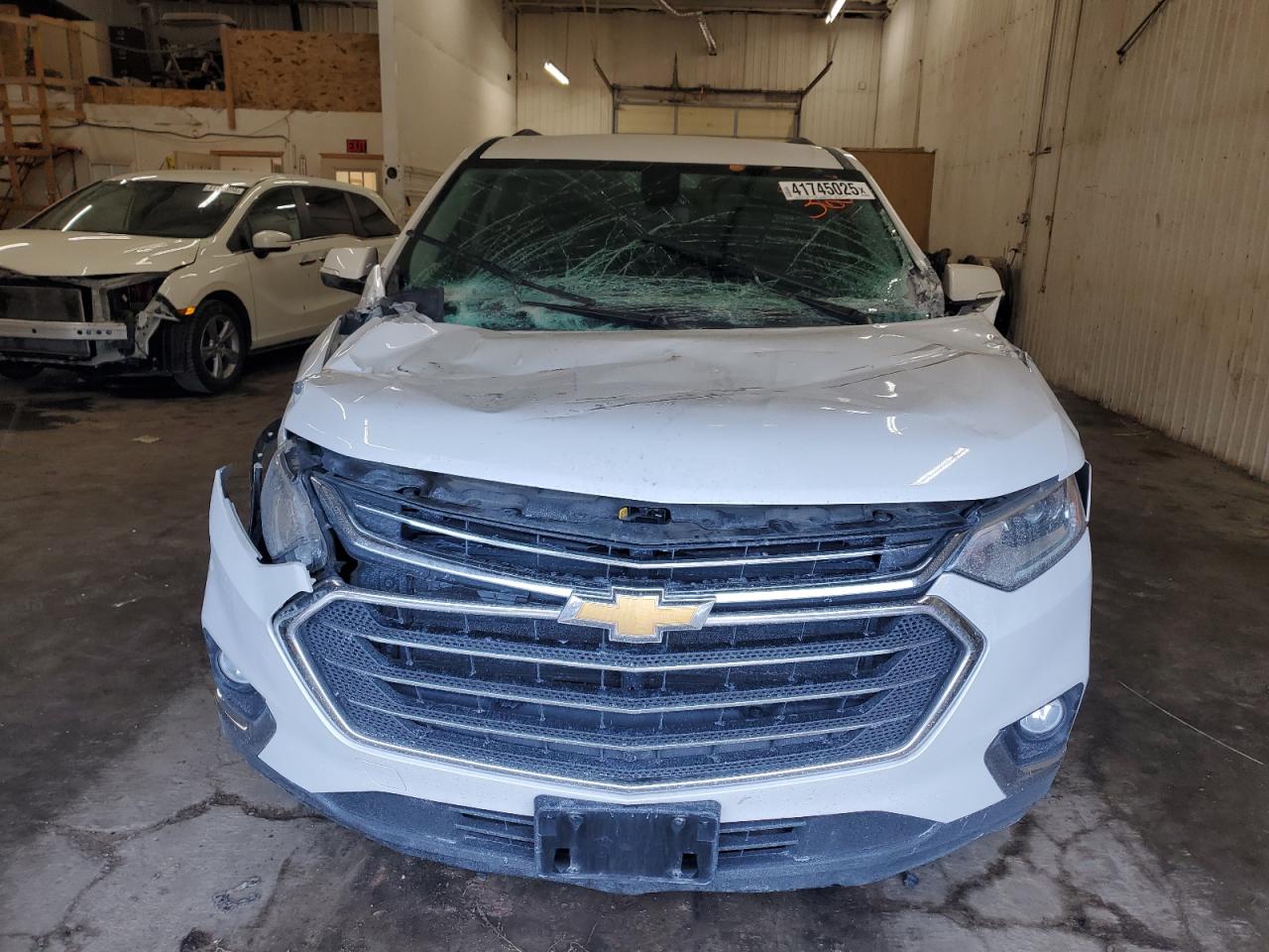 2019 Chevrolet Traverse VIN 1GNEVHKWXKJ211749 Copart auction photo, front end damage thumbnail 5