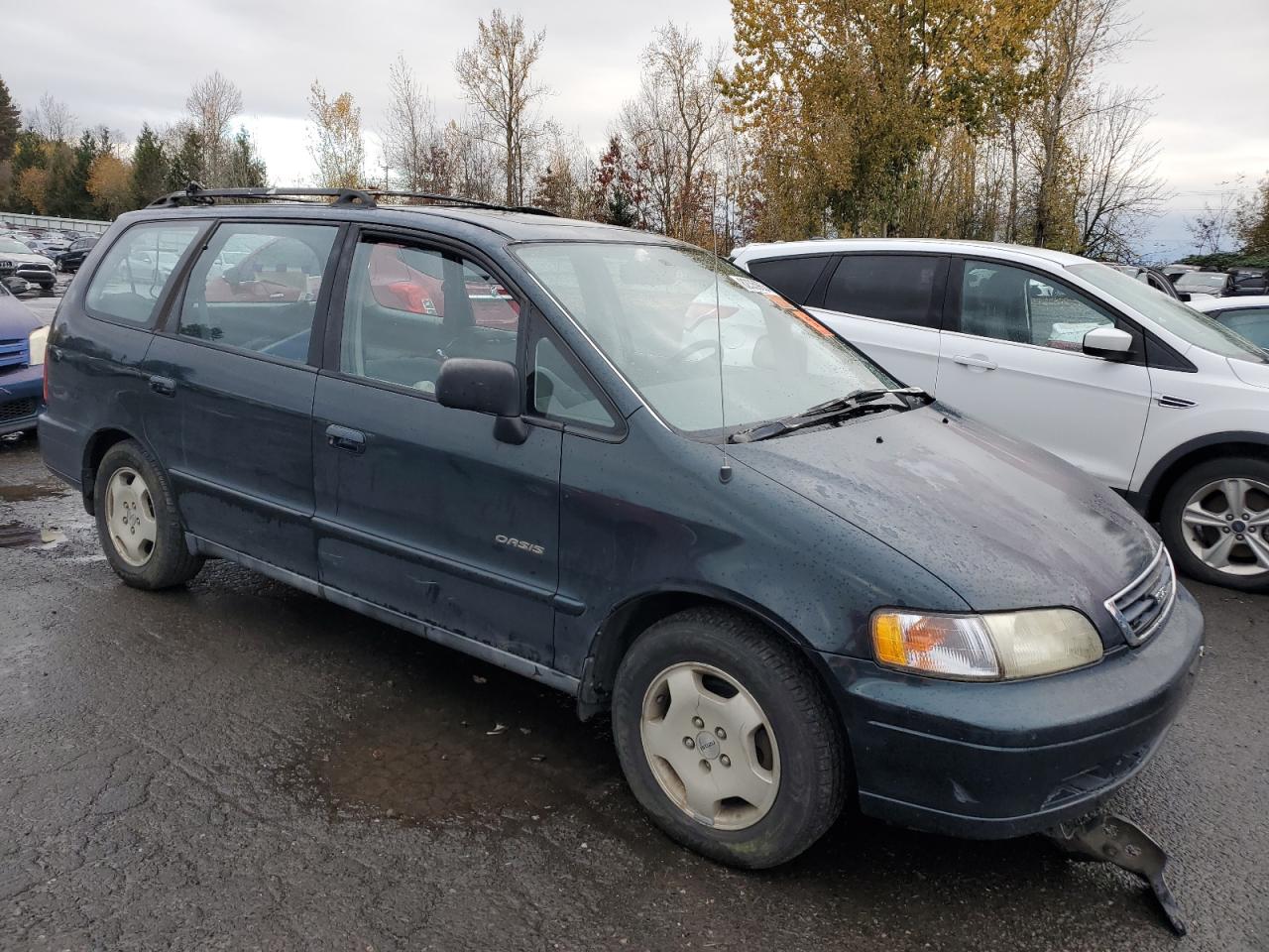 1996 Isuzu Oasis VIN JR2RJ1878TC001809 Copart auction photo, biohazard/chemical damage thumbnail 4