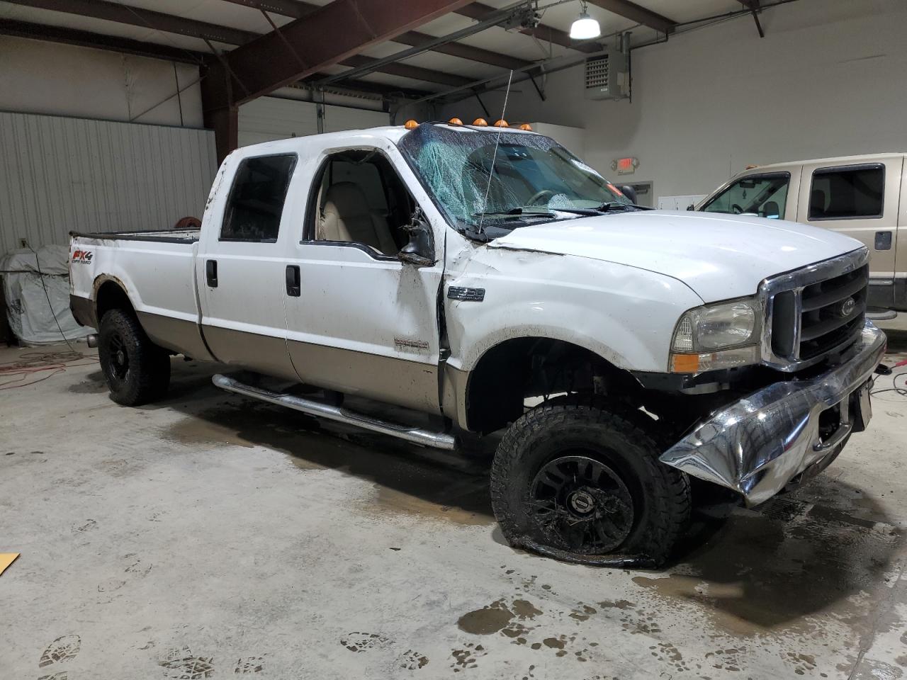 2004 Ford F350 VIN 1FTSW31P64ED69958 Copart auction photo, all over damage thumbnail 4