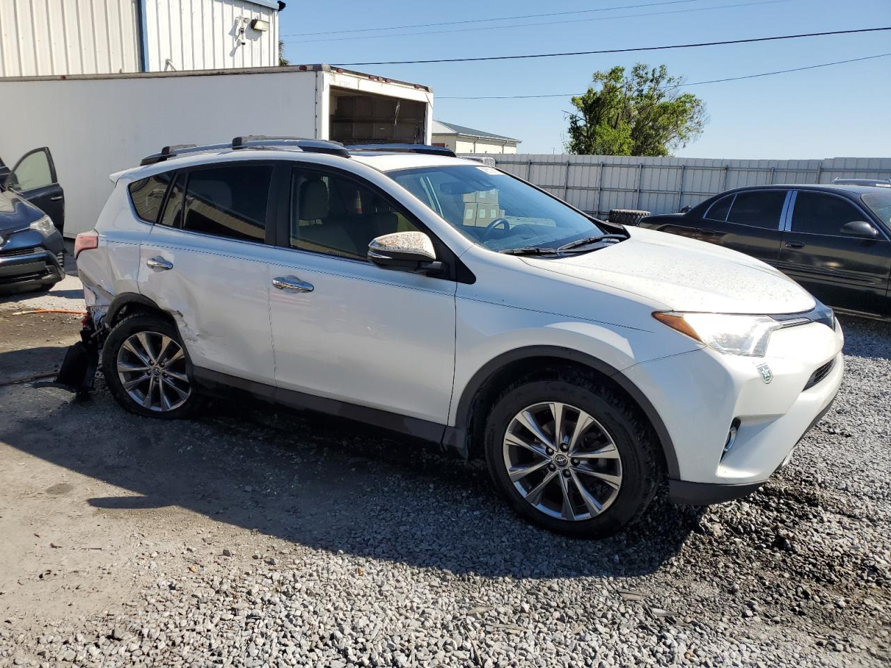 2018 Toyota RAV 4 VIN JTMYFREV7JJ157885 Copart auction photo, rear end / undercarriage damage thumbnail 4