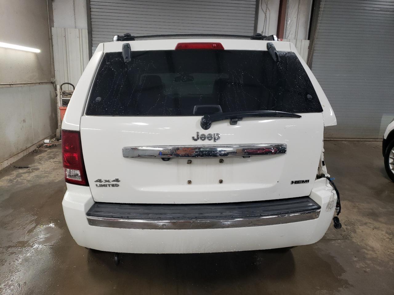 2010 Jeep Grand Cherokee VIN 1J4RR5GT2AC114294 Copart auction photo, rear end / front end damage thumbnail 6