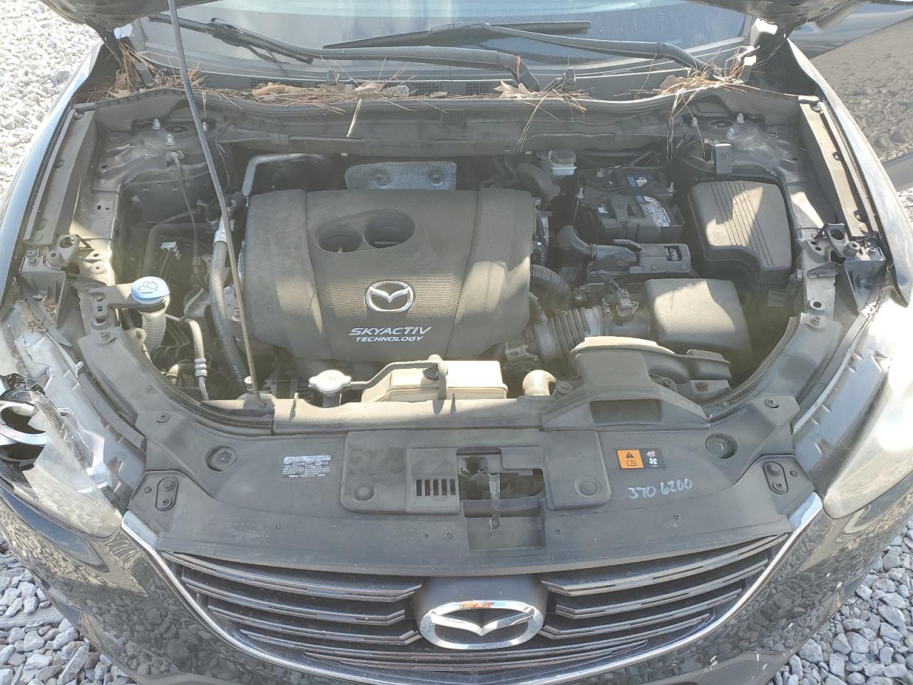 2016 Mazda CX-5 VIN JM3KE2CY3G0655018 Copart auction photo, all over damage thumbnail 14