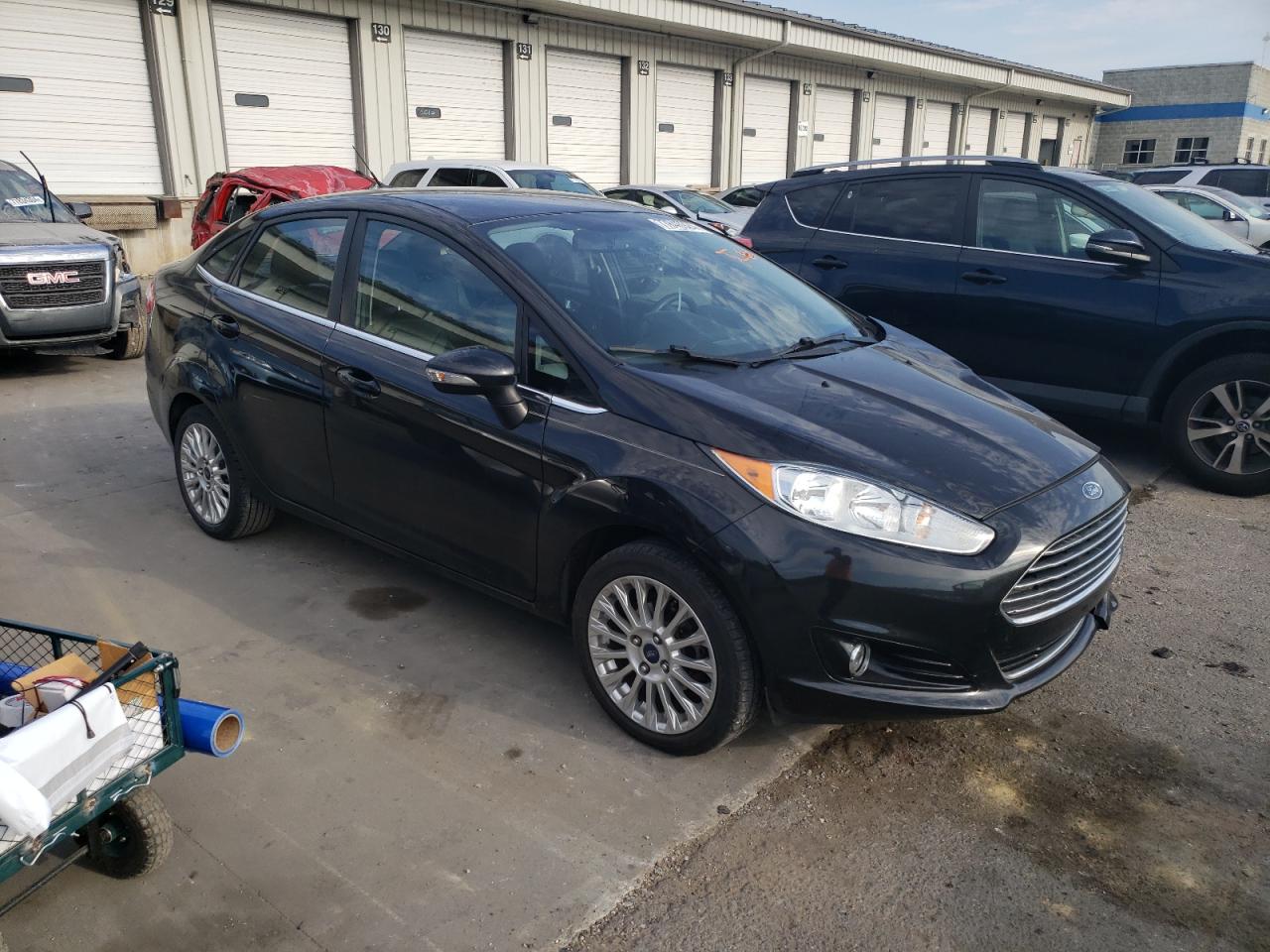 2014 Ford Fiesta VIN 3FADP4CJXEM206901 Copart auction photo, all over damage thumbnail 4