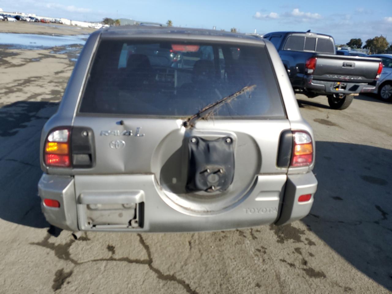 2000 Toyota RAV 4 VIN JT3GP10V4Y7077344 Copart auction photo, rear end / undercarriage damage thumbnail 6