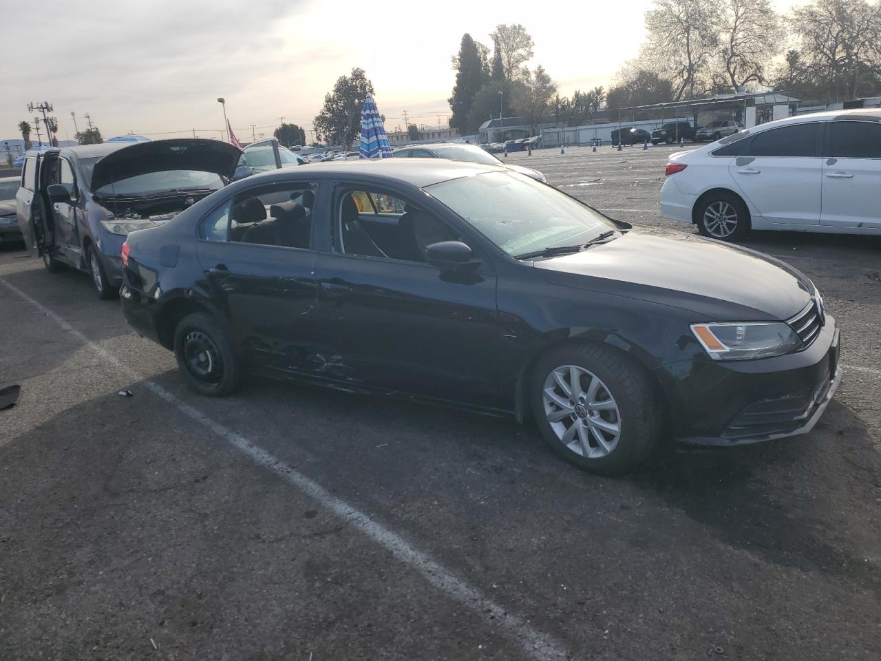 2015 Volkswagen Jetta VIN 3VWD17AJ4FM302019 Copart auction photo, side / minor dent/scratches damage thumbnail 4