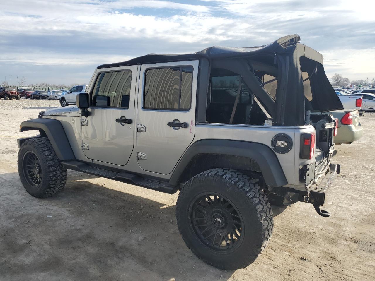 2016 Jeep Wrangler VIN 1C4BJWDG9GL345410 Copart auction photo, rear end damage thumbnail 2