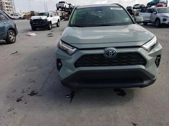 2022 Toyota RAV 4 VIN JTMB6RFV3ND061888 Copart auction photo, side damage thumbnail 12
