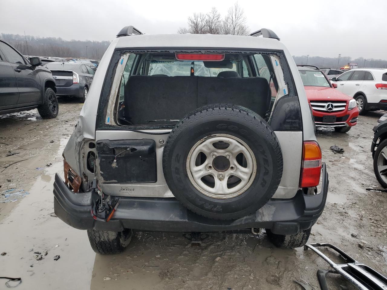 2003 Chevrolet Tracker VIN 2CNBJ13C636952168 Copart auction photo, all over damage thumbnail 6