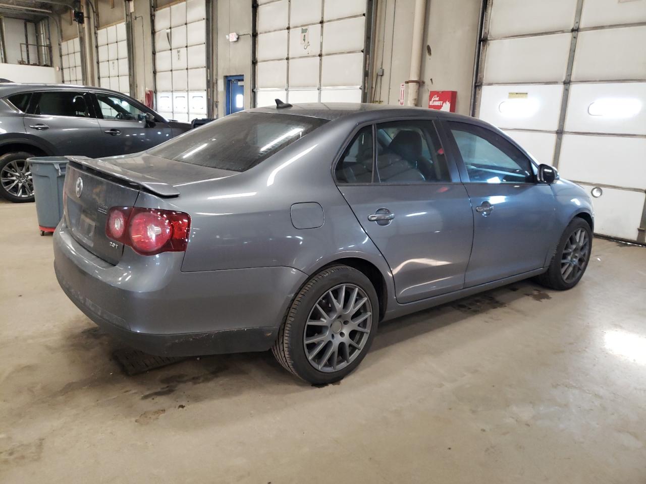 2009 Volkswagen Jetta VIN 3VWRA71K59M032737 Copart auction photo, mechanical damage thumbnail 3