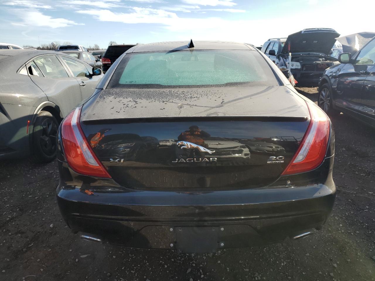 2017 Jaguar XJ VIN SAJWJ1CD5H8W04895 Copart auction photo, all over damage thumbnail 6