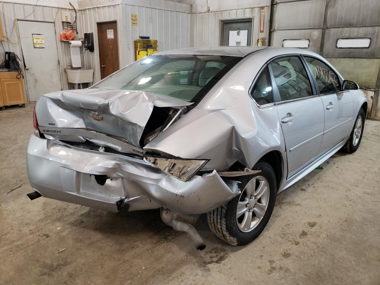 2012 Chevrolet Impala VIN 2G1WF5E39C1143099 Copart auction photo, rear end / undercarriage damage thumbnail 4