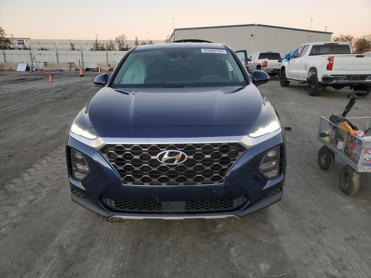 2019 Hyundai Santa Fe VIN 5NMS2CAD4KH115788 Copart auction photo, rear end damage thumbnail 5