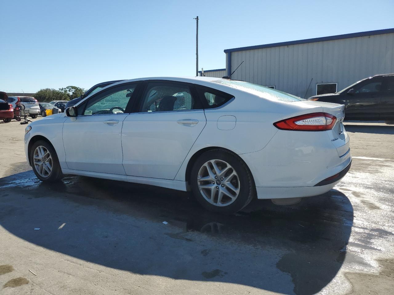 2016 Ford Fusion VIN 3FA6P0H74GR386381 Copart auction photo, side / minor dent/scratches damage thumbnail 2