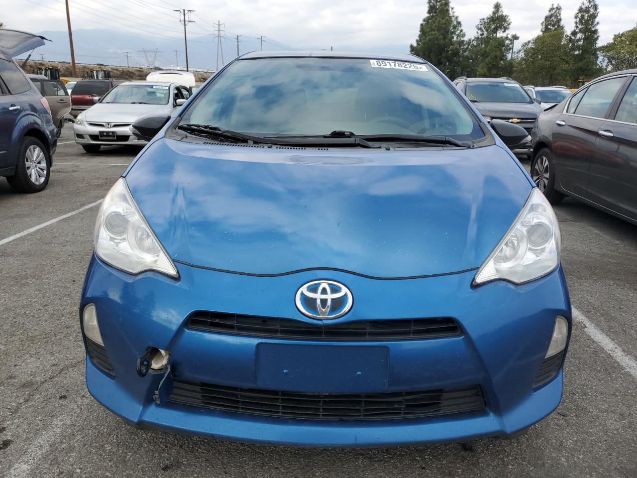 2014 Toyota Prius VIN JTDKDTB38E1559058 Copart auction photo, all over damage thumbnail 5