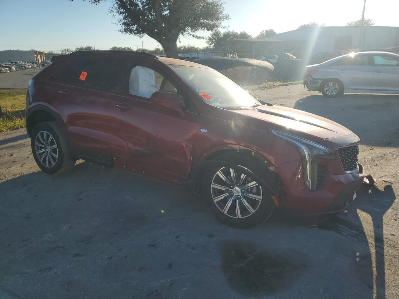 2019 Cadillac XT4 VIN 1GYFZER45KF229464 Copart auction photo, front end / rear end damage thumbnail 4