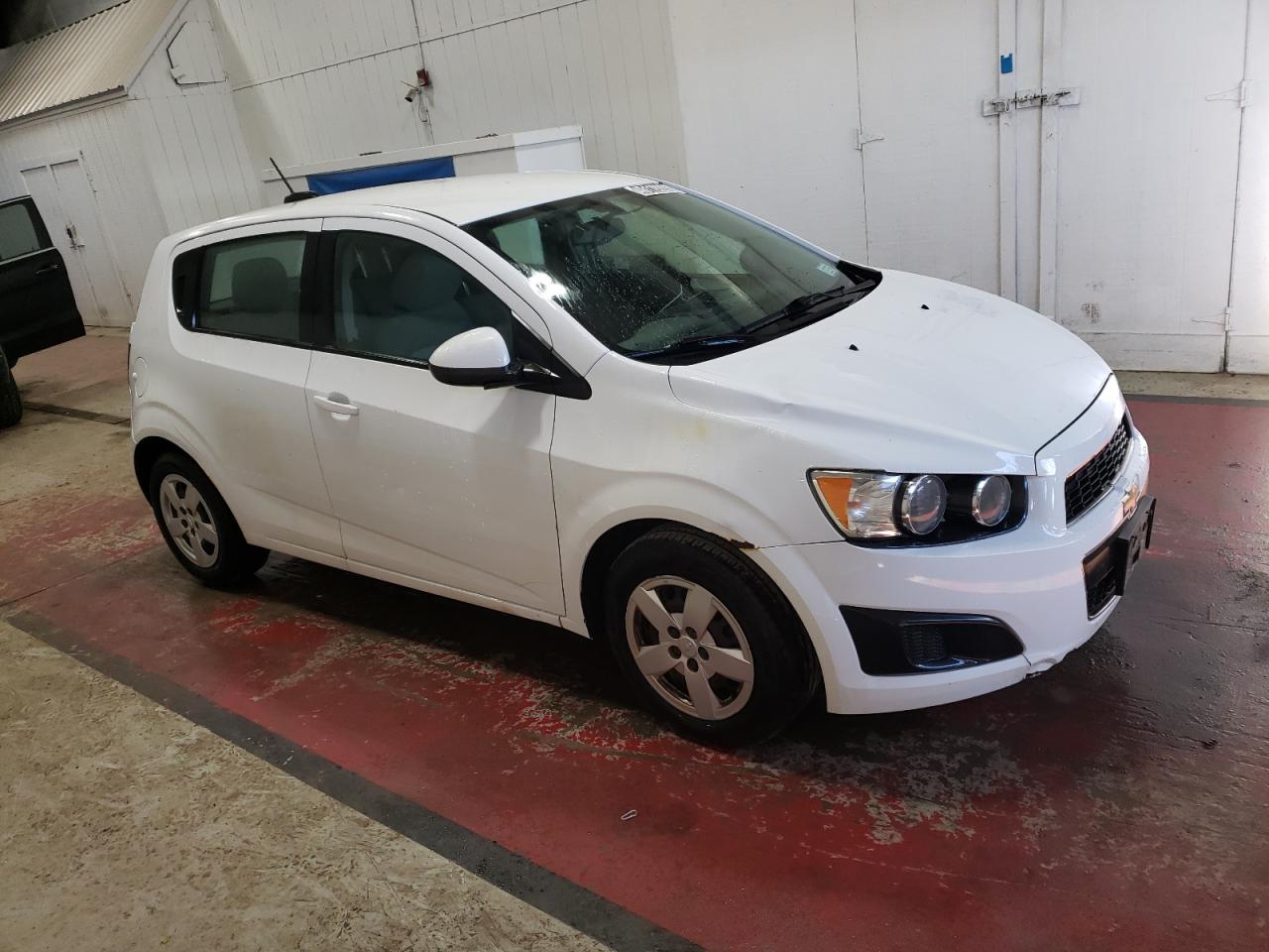 2015 Chevrolet Sonic VIN 1G1JA6SH7F4133694 Copart auction photo, normal wear / minor dent/scratches damage thumbnail 4
