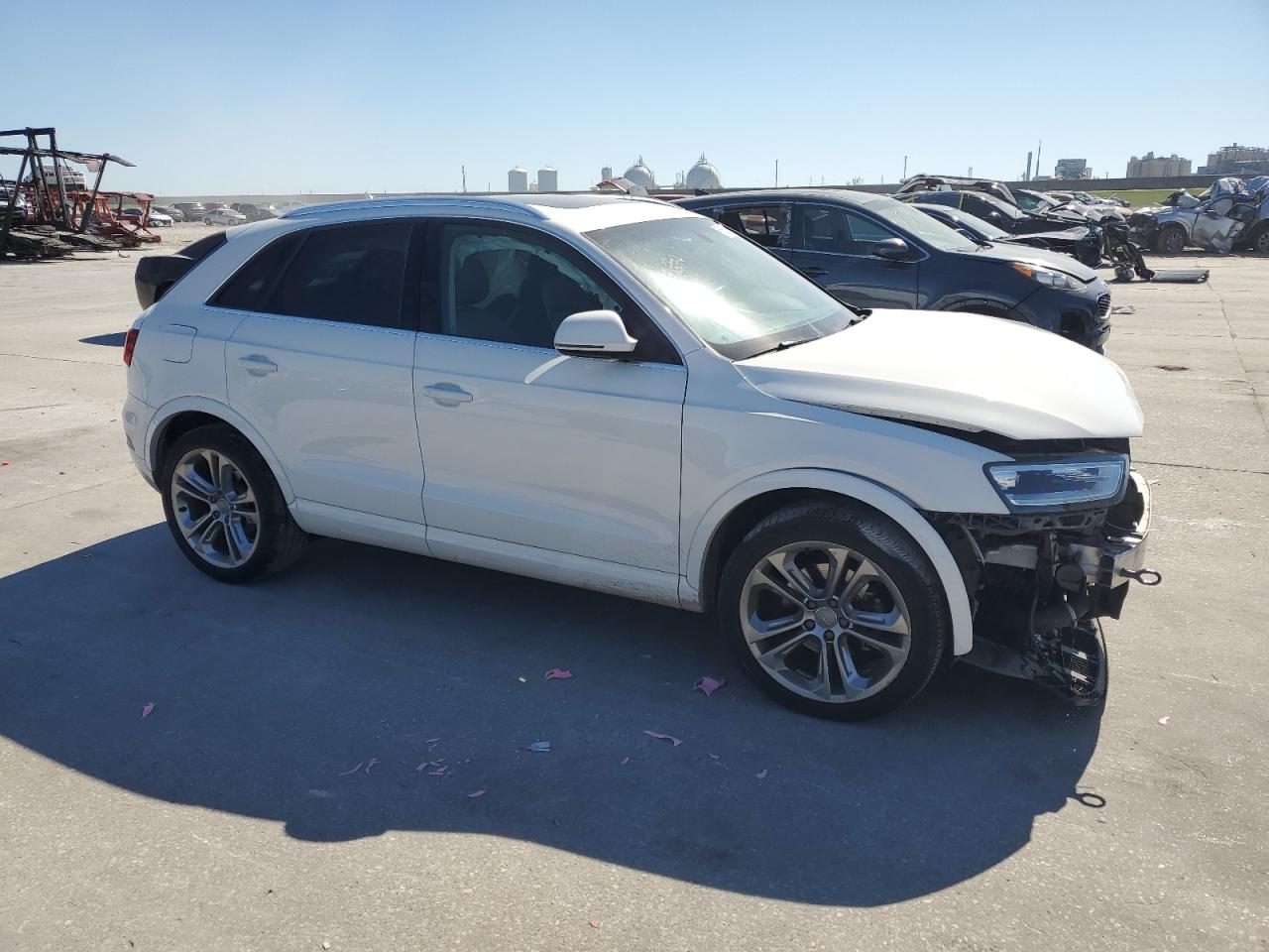 2015 Audi Q3 VIN WA1FFCFS3FR011611 Copart auction photo, front end damage thumbnail 4