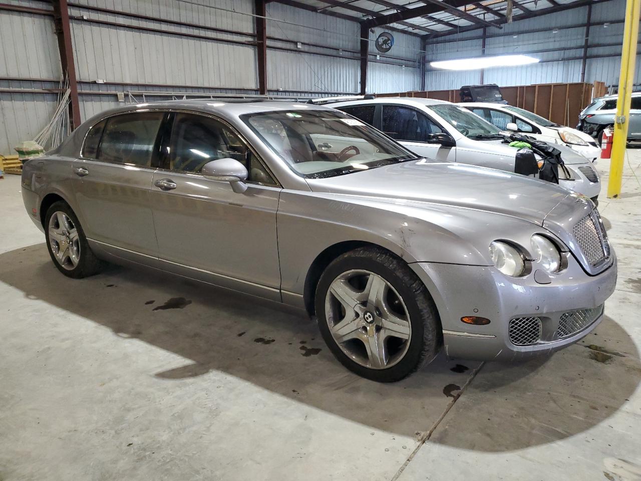 2006 Bentley Continental VIN SCBBR53W06C034462 Copart auction photo, side / rear end damage thumbnail 4