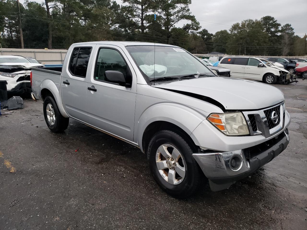 2009 Nissan Navara (Frontier) VIN 1N6AD07U29C424774 Copart auction photo, front end / side damage thumbnail 4