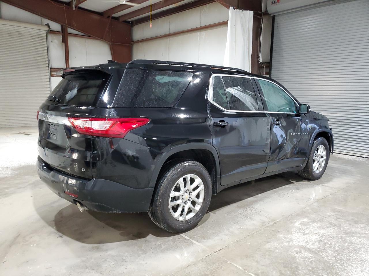 2021 Chevrolet Traverse VIN 1GNEVGKW0MJ257698 Copart auction photo, side / front end damage thumbnail 3