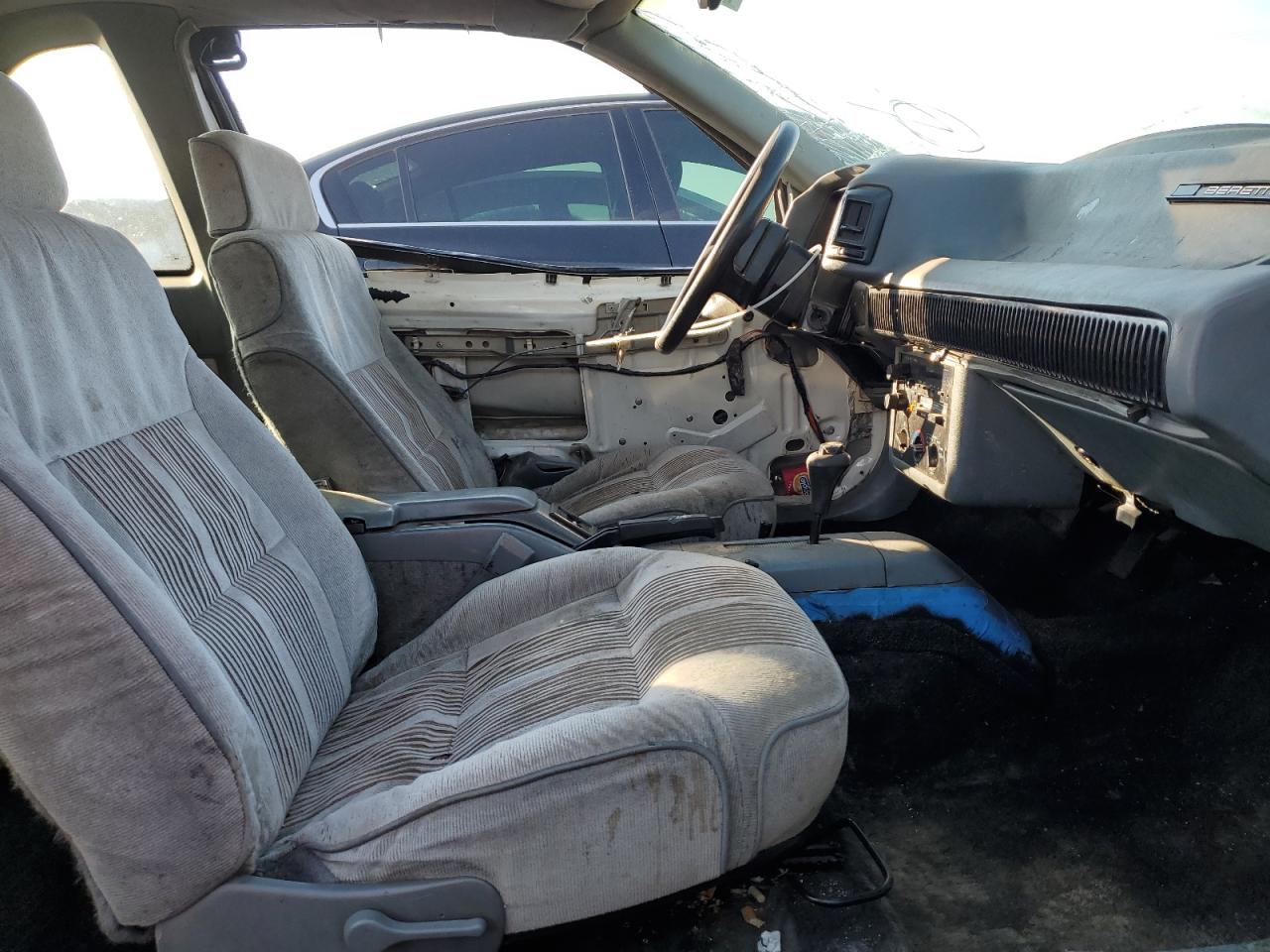 1990 Chevrolet Beretta VIN 1G1LW14T1LE136918 Copart auction photo, side damage thumbnail 7