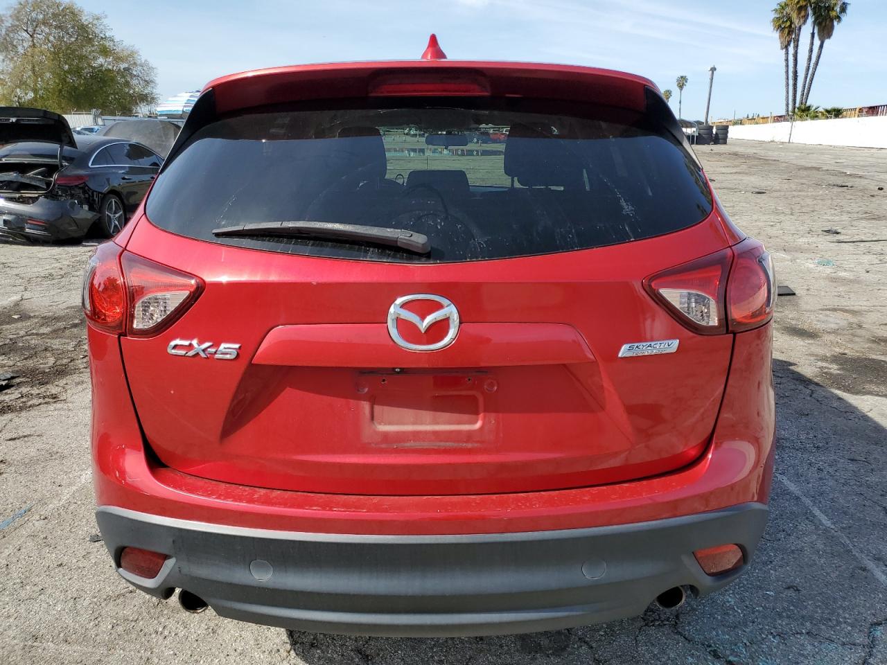 2014 Mazda CX-5 VIN JM3KE2CY2E0385518 Copart auction photo, front end / minor dent/scratches damage thumbnail 6