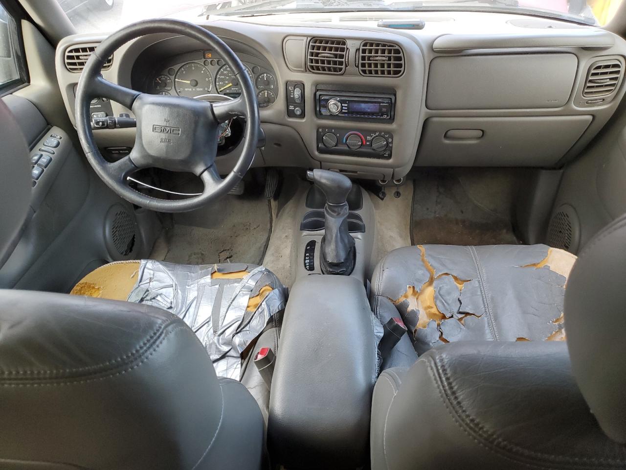 2000 GMC Jimmy VIN 1GKCS13WXY2180539 Copart auction photo, vandalism damage thumbnail 8