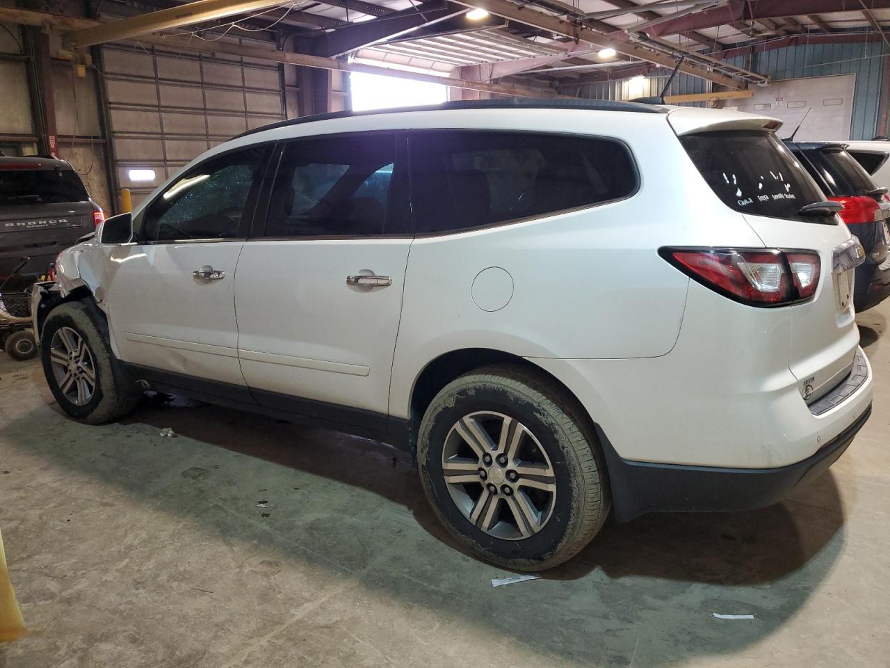 2016 Chevrolet Traverse VIN 1GNKVHKD2GJ294859 Copart auction photo, front end / minor dent/scratches damage thumbnail 2