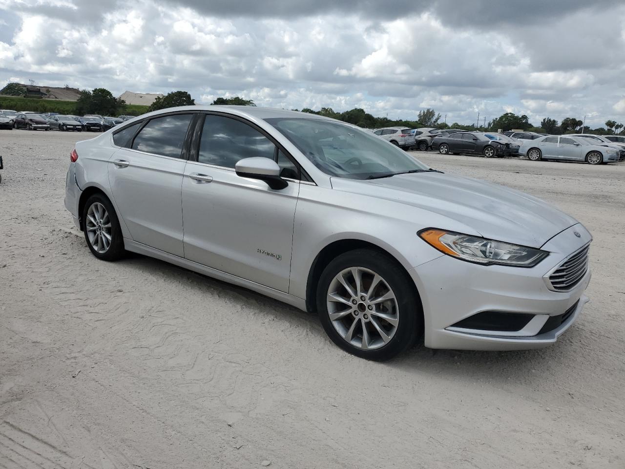 2017 Ford Fusion VIN 3FA6P0UU5HR183061 Copart auction photo, side / minor dent/scratches damage thumbnail 4