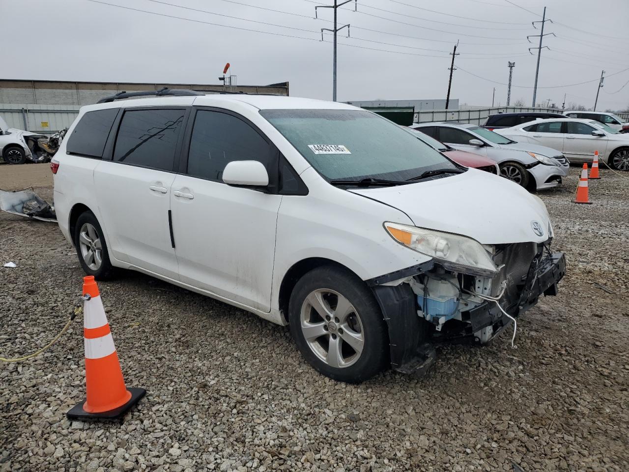 2015 Toyota Sienna VIN 5TDKK3DC0FS596015 Copart auction photo, front end damage thumbnail 4