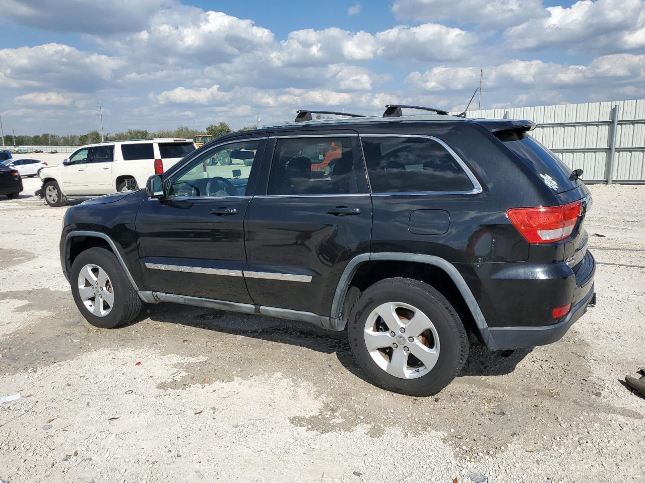 2012 Jeep Grand Cherokee VIN 1C4RJFAG7CC221634 Copart auction photo, side / minor dent/scratches damage thumbnail 2