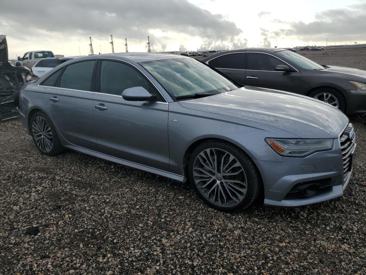 2017 Audi A6 VIN WAUG8AFC1HN035768 Copart auction photo, side / minor dent/scratches damage thumbnail 4