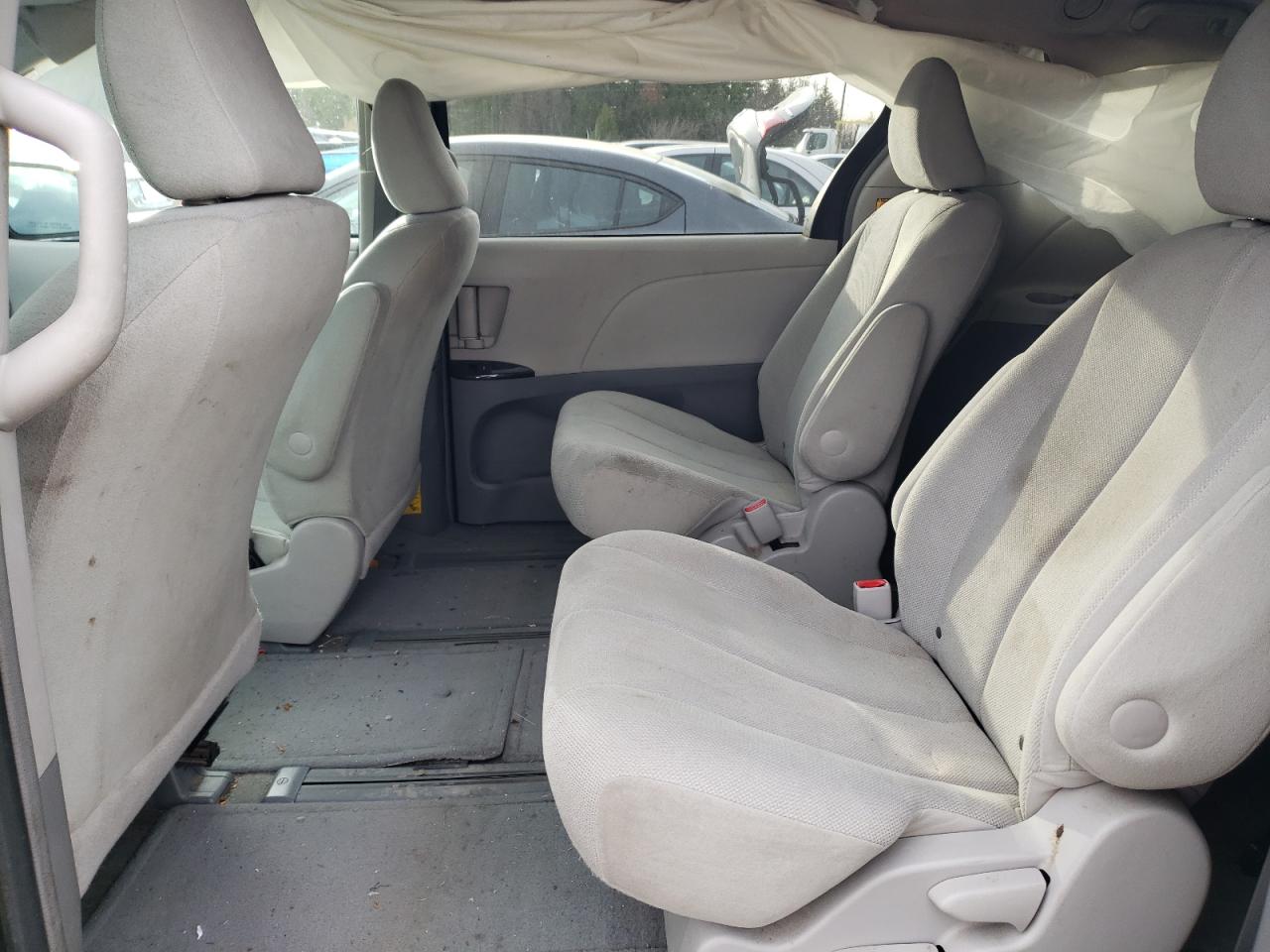 2012 Toyota Sienna VIN 5TDZK3DC6CS245104 Copart auction photo, side / front end damage thumbnail 11
