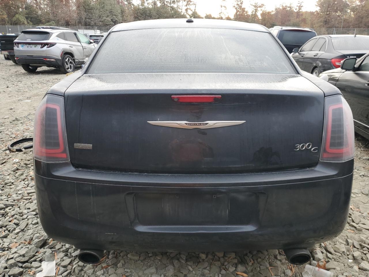 2013 Chrysler 300 VIN 2C3CCADG3DH743890 Copart auction photo, front end / undercarriage damage thumbnail 6