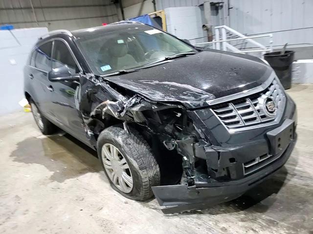 2015 Cadillac SRX VIN 3GYFNEE38FS610316 Copart auction photo, front end / minor dent/scratches damage thumbnail 12