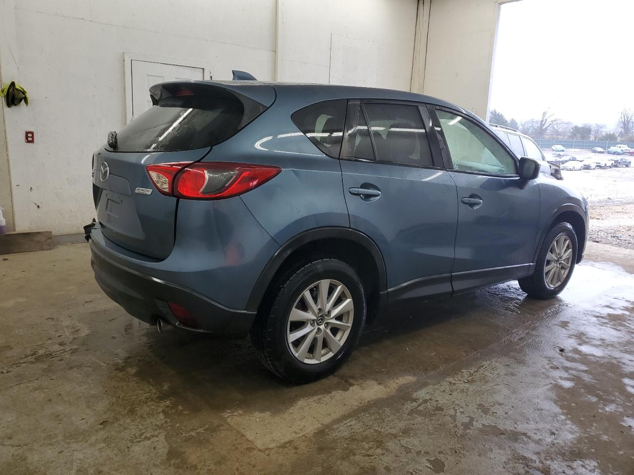 2015 Mazda CX-5 VIN JM3KE2CYXF0554556 Copart auction photo, rear end / undercarriage damage thumbnail 3
