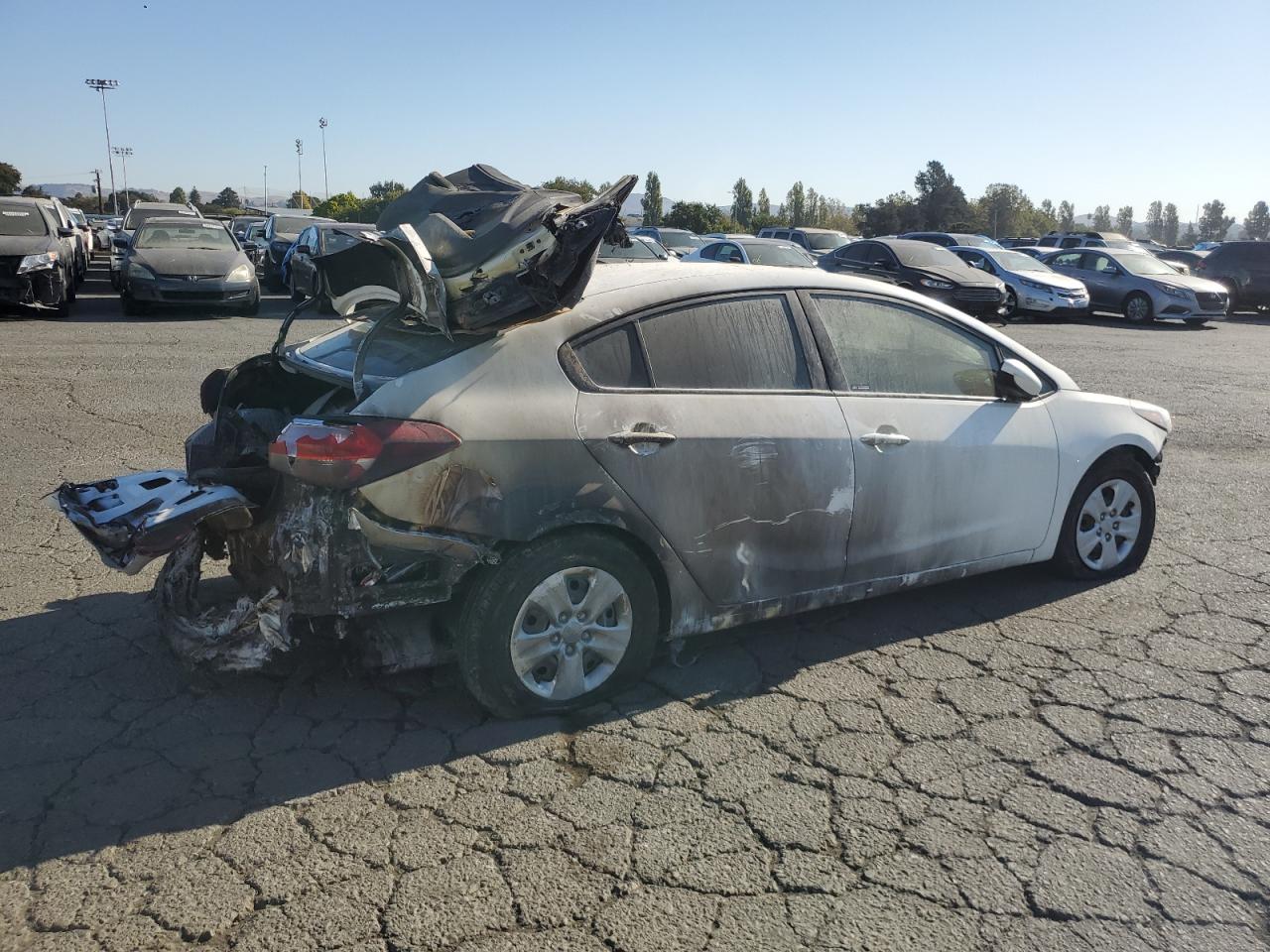 2017 KIA Forte VIN 3KPFK4A7XHE057574 Copart auction photo, burn damage thumbnail 3