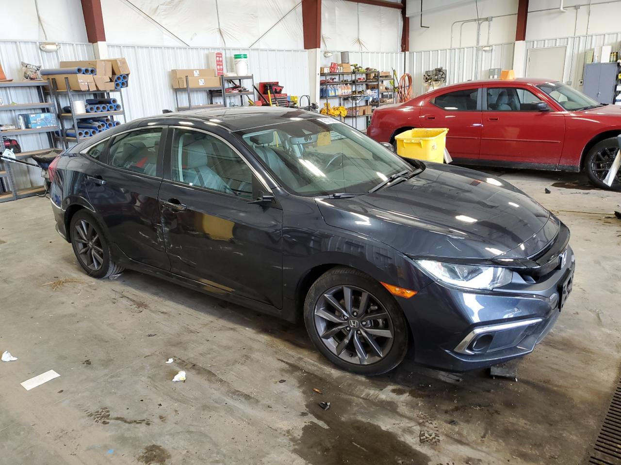 2020 Honda Civic VIN 19XFC1F70LE014892 Copart auction photo, front end / side damage thumbnail 4