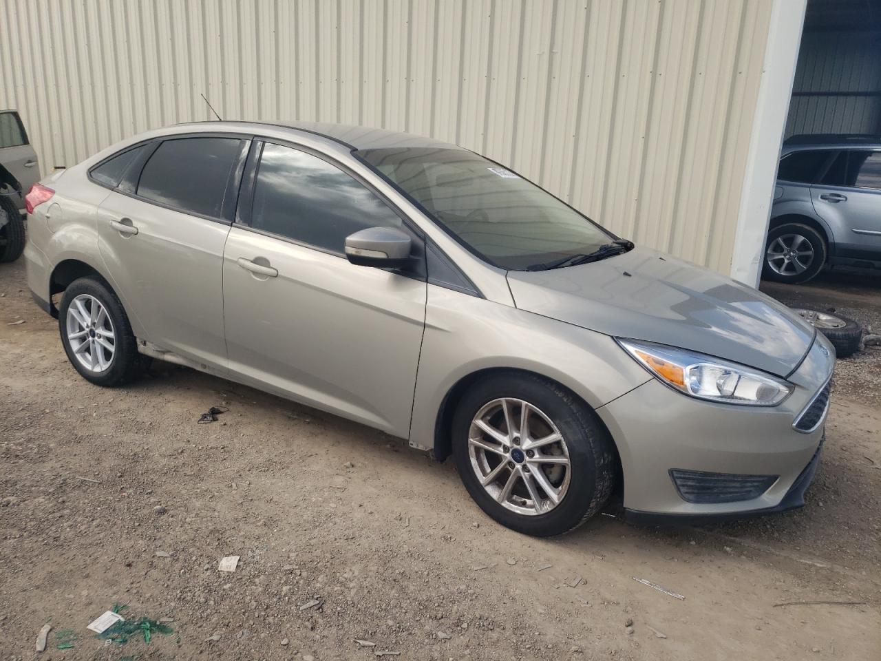 2016 Ford Focus VIN 1FADP3F27GL379388 Copart auction photo, side / minor dent/scratches damage thumbnail 4