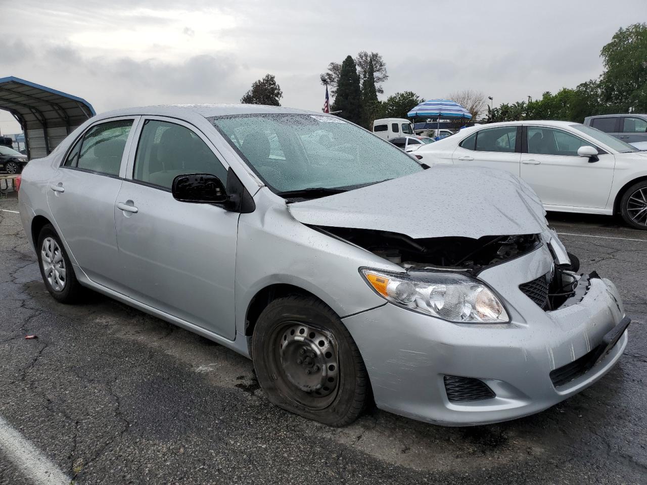 2009 Toyota Corolla VIN JTDBL40E69J036558 Copart auction photo, front end / minor dent/scratches damage thumbnail 4